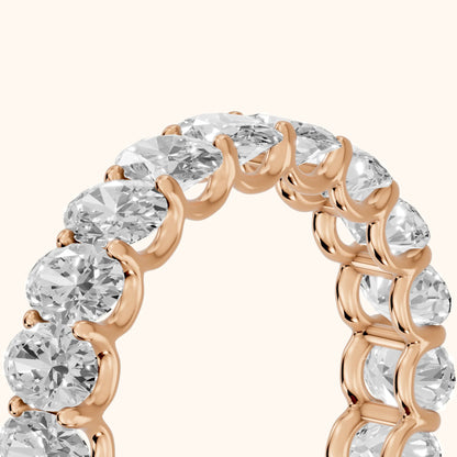 Ivana Shared Prong Oval Diamond Eternity Band in Rose Gold - slant-view