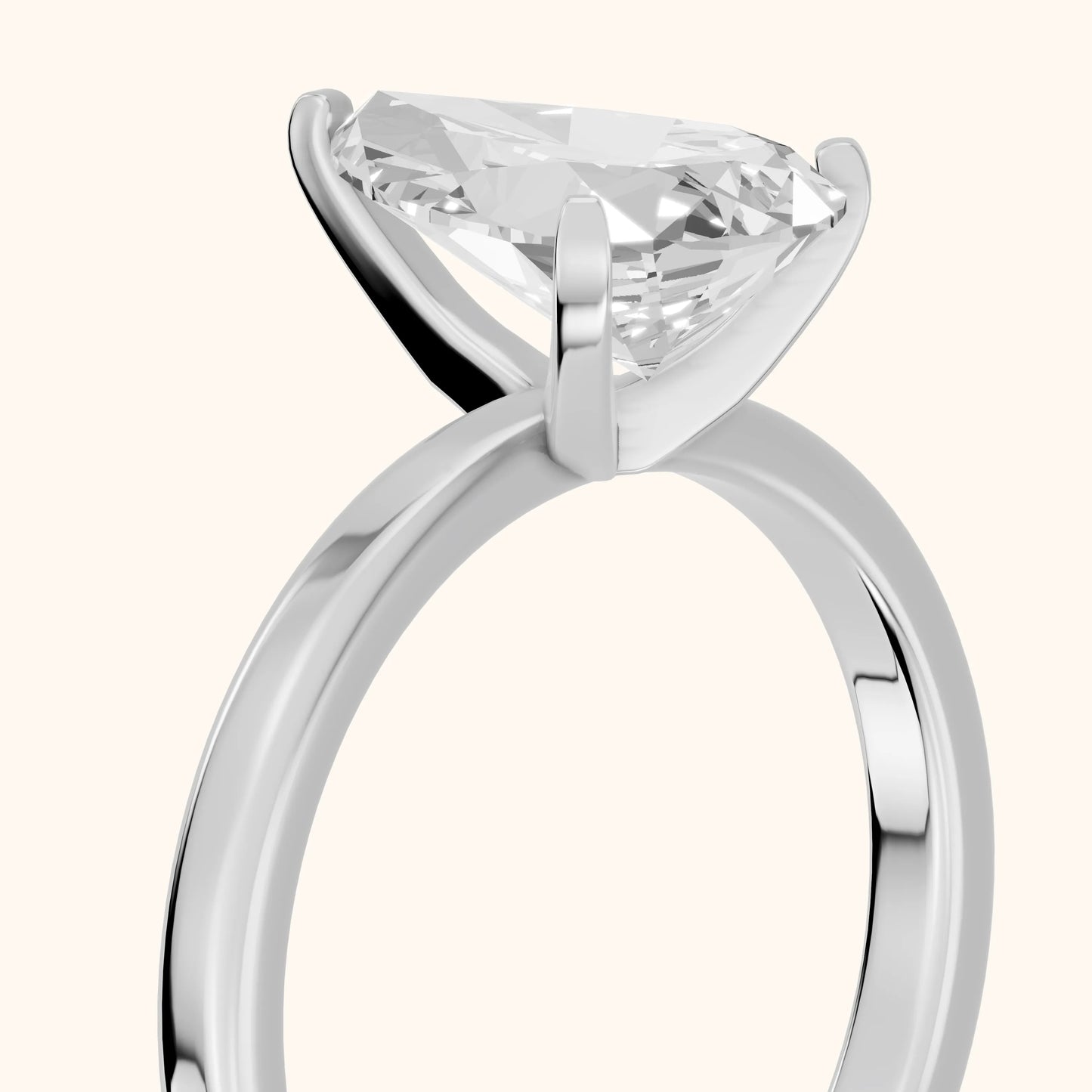Liana Solitaire Claw Prong Pear Diamond Engagement Ring in Platinum - slant-view.webp