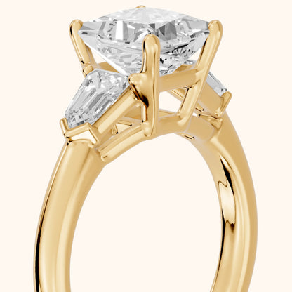 Dorothea Baguette Three-Stone Princess Diamond Engagement Ring in Yellow Gold - slant-view.webp