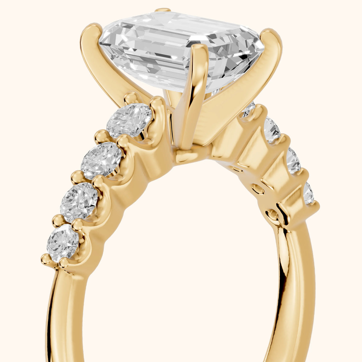 Augusta Graduated Pavé Emerald Diamond Engagement Ring in Yellow Gold - slant-view.webp