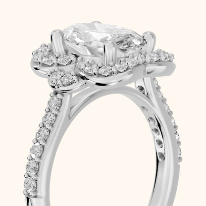 Amy Floral Halo Oval Diamond Engagement Ring in Platinum - slant-view.webp