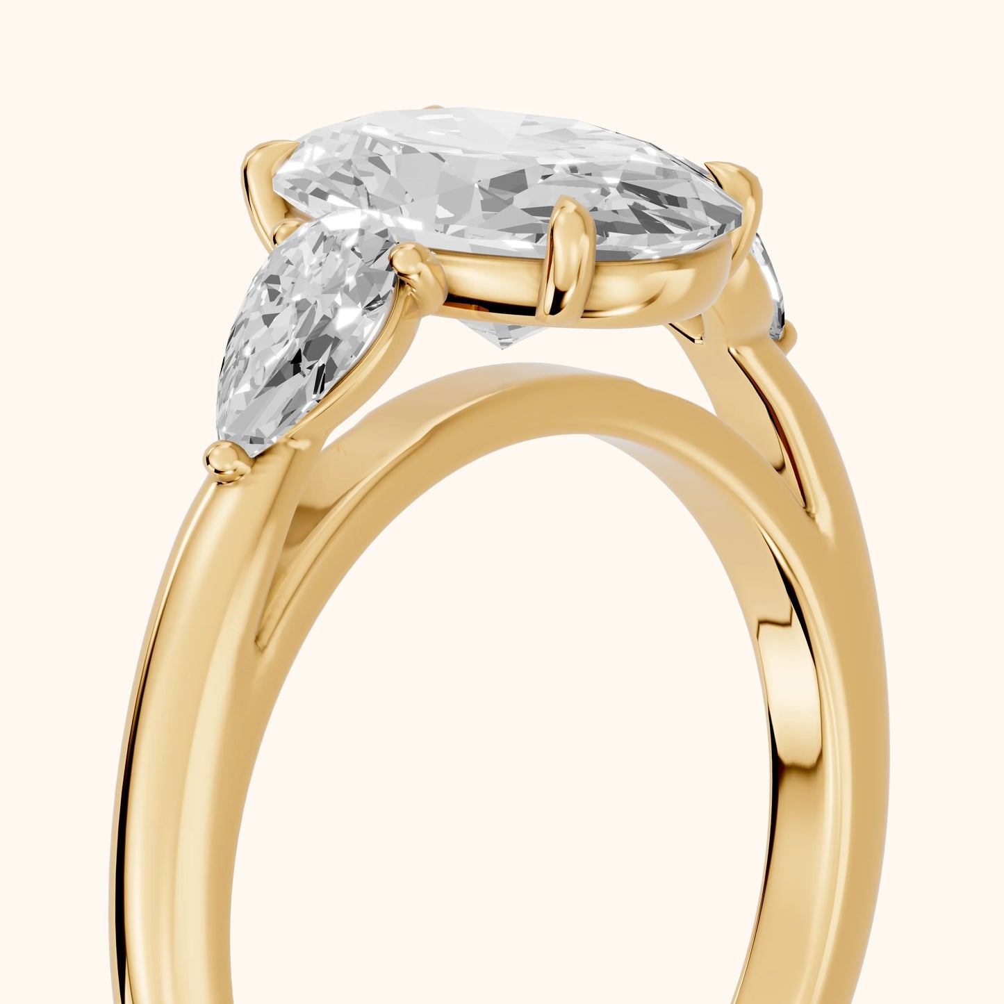 Phoebe Three-Stone Oval Diamond Ring in Yellow Gold - slant-view.webp