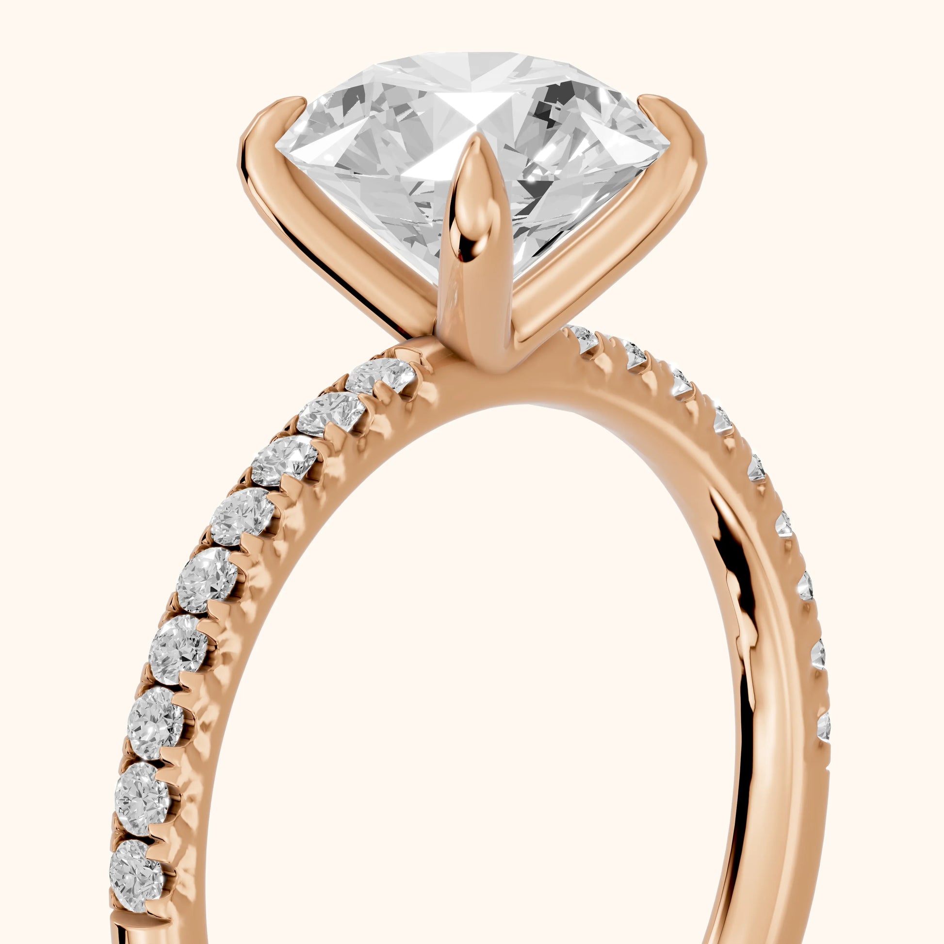 Ione Solitaire Pavé Round Diamond Engagement Ring in Rose Gold - slant-view.webp