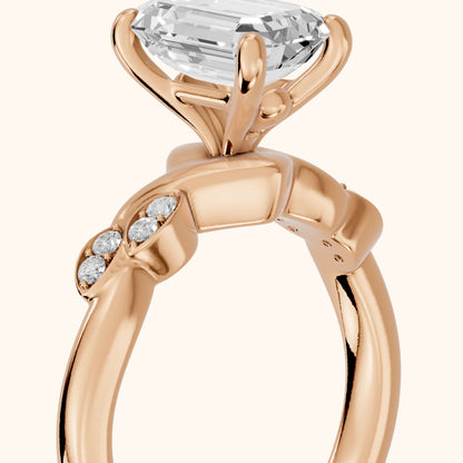 Robin Leaf Twist Emerald Diamond Engagement Ring in Rose Gold - slant-view.webp