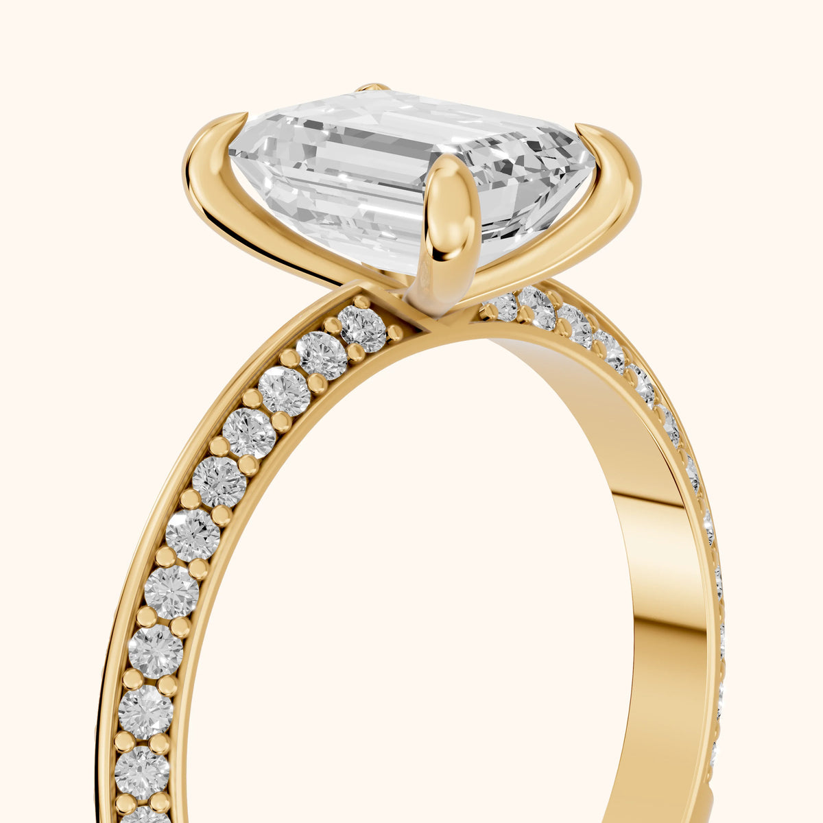 Meredith Knife Edge Pavé Emerald Diamond Engagement Ring in Yellow Gold - slant-view.webp