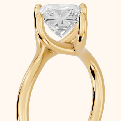 Clio Bypass Solitaire Princess Diamond Engagement Ring in Yellow Gold - slant-view.webp
