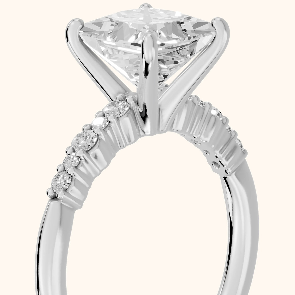 Deirdre Graduated Pavé Princess Diamond Engagement Ring in Platinum - slant-view.webp