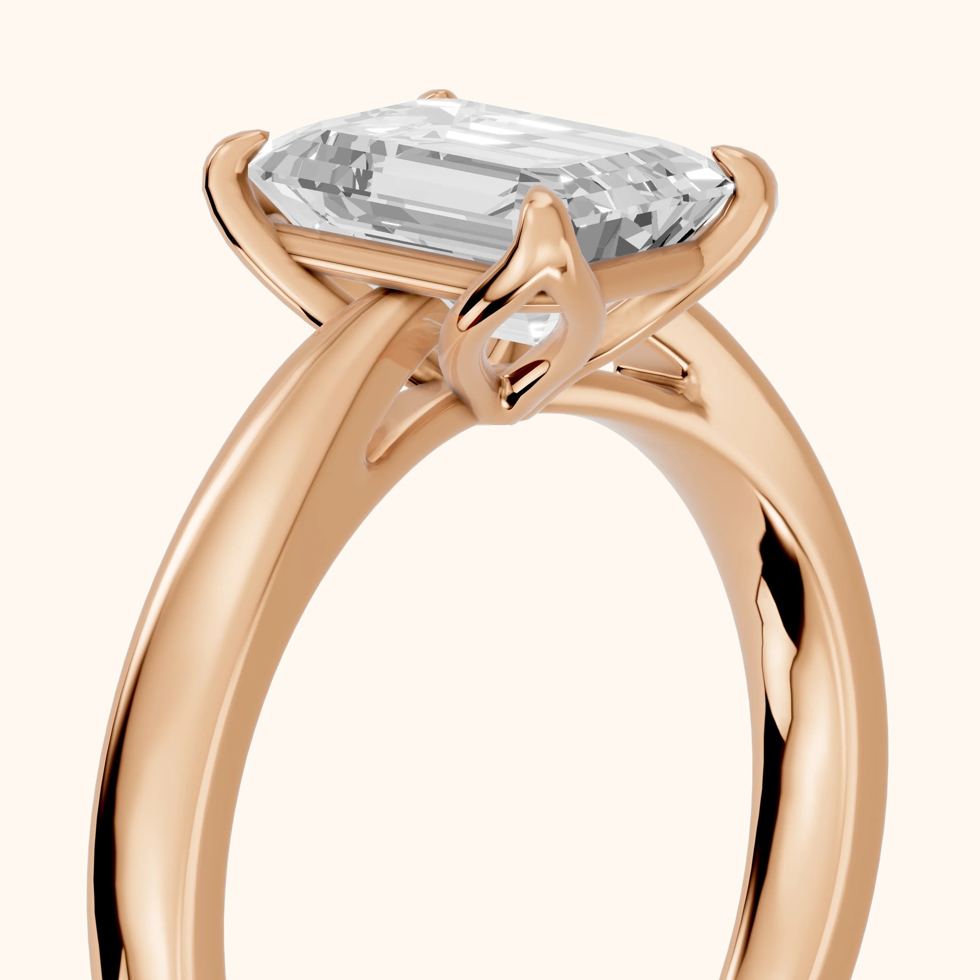 Lucia Solitaire Six-Prong Emerald Diamond Engagement Ring in Rose Gold - slant-view.webp