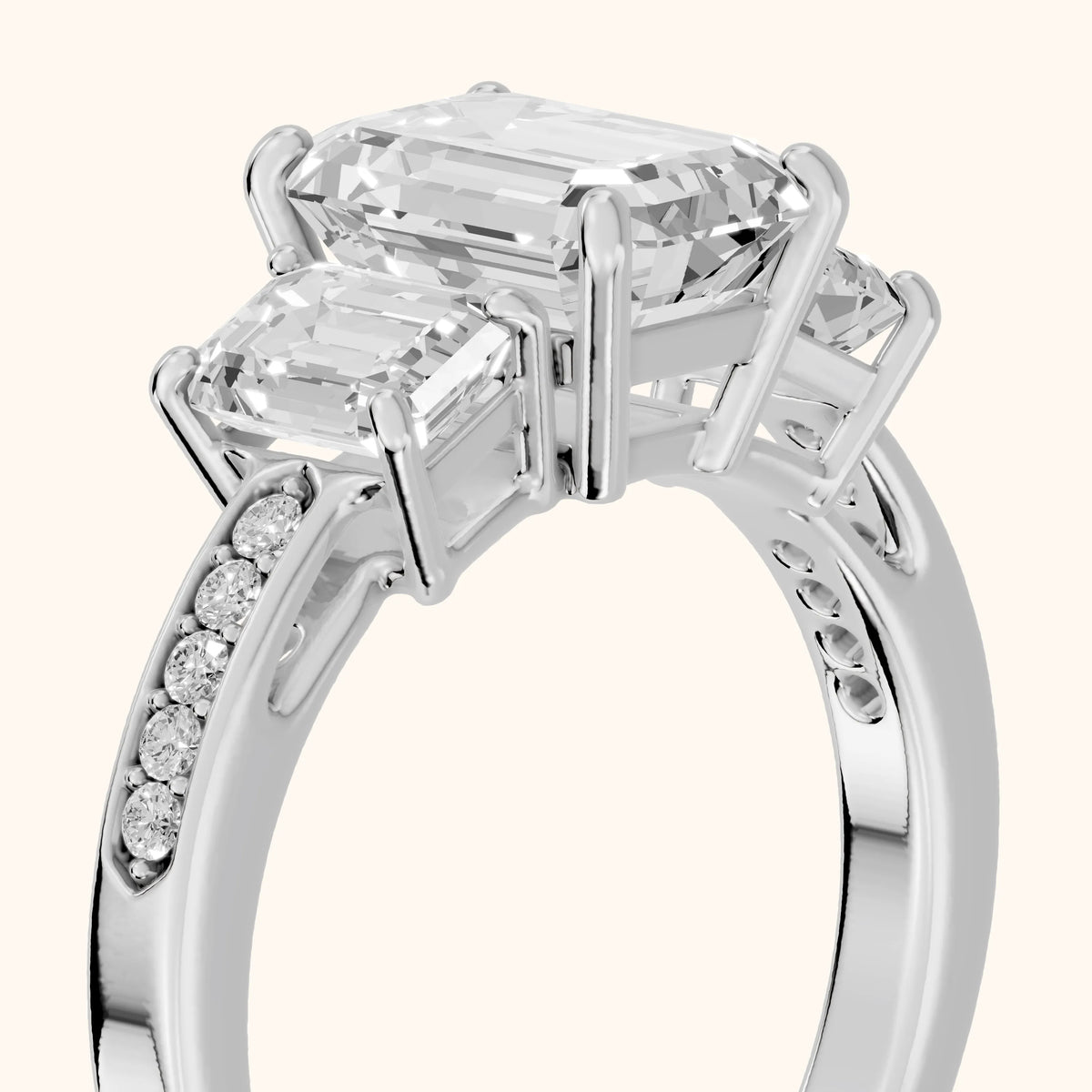 Ariana Three-Stone Pavé Emerald Diamond Engagement Ring in White Gold - slant-view.webp