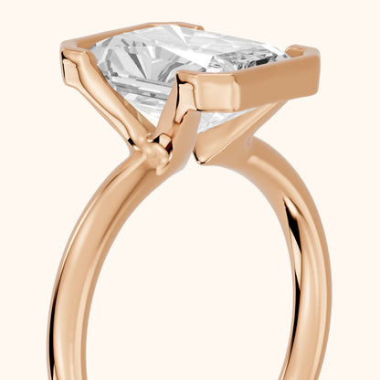 Winslow Partial Bezel Solitaire Radiant Diamond Engagement Ring in Rose Gold - slant-view.webp