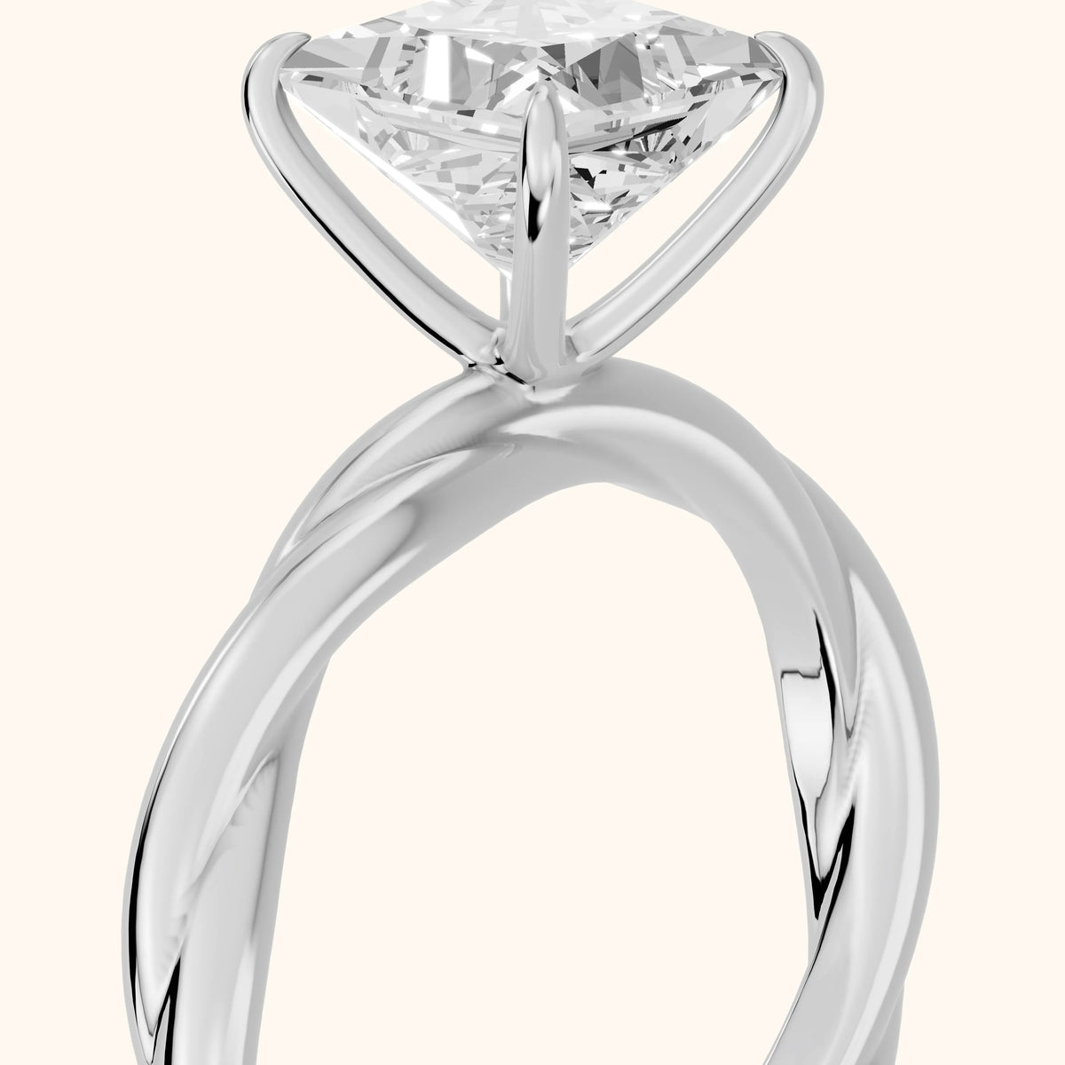 Nicola Twist Solitaire Princess Diamond Engagement Ring in White Gold - slant-view.webp