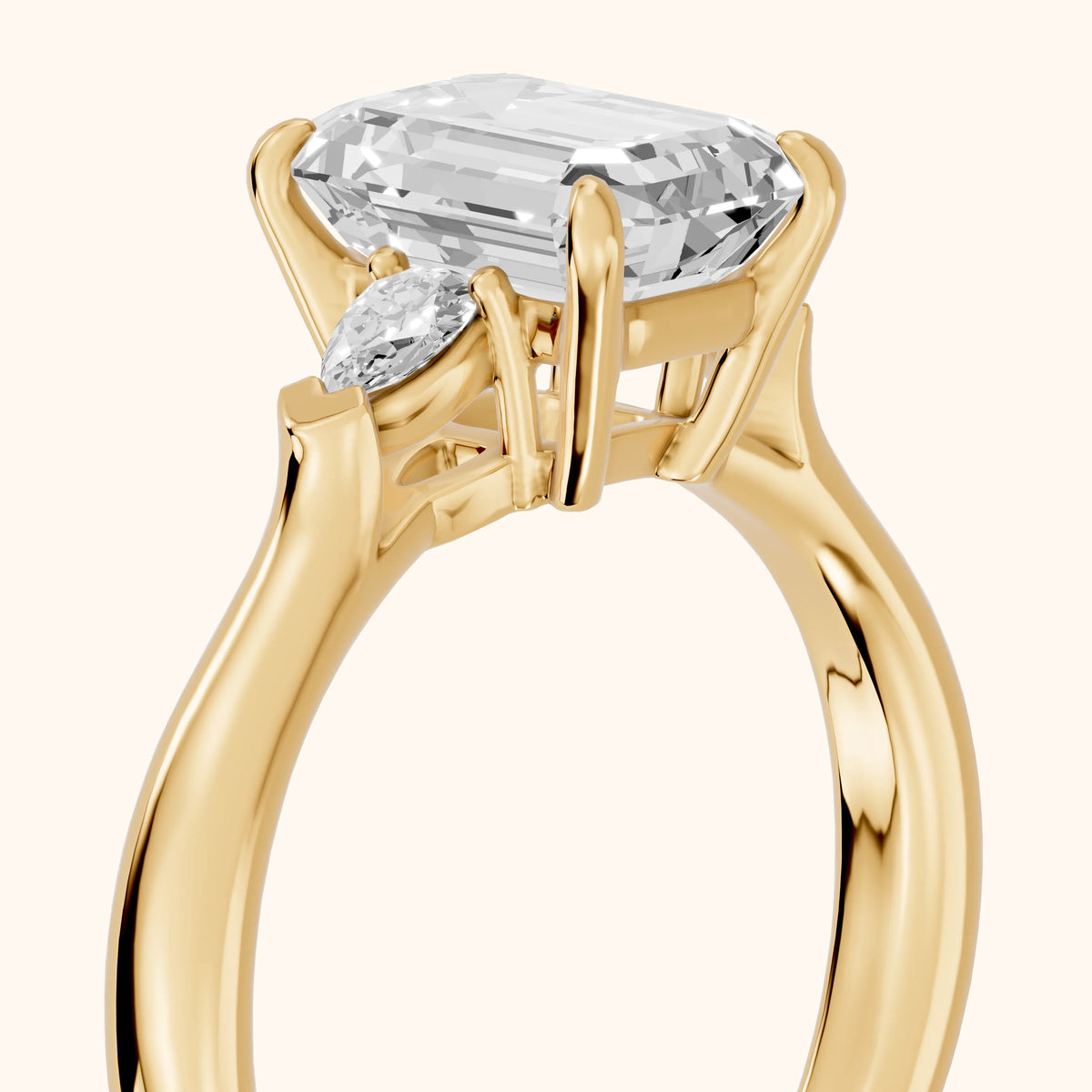 Dahlia Three-Stone Cathedral Emerald Diamond Engagement Ring in Yellow Gold - slant-view.webp