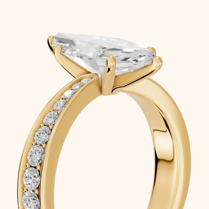 Rhea Sidestone Pavé Marquise Diamond Engagement Ring in Yellow Gold - slant-view.webp