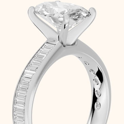 Medina Baguette Channel Set Oval Diamond Engagement Ring in Platinum - slant-view.webp