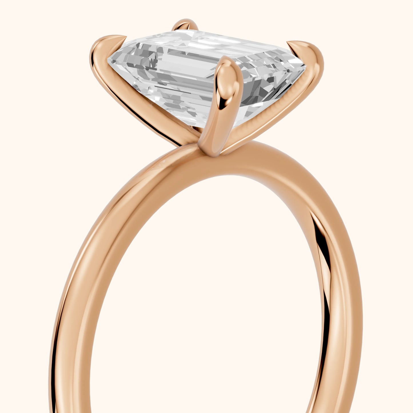 Nella Petite Solitaire Emerald Diamond Engagement Ring in Rose Gold - slant-view.webp
