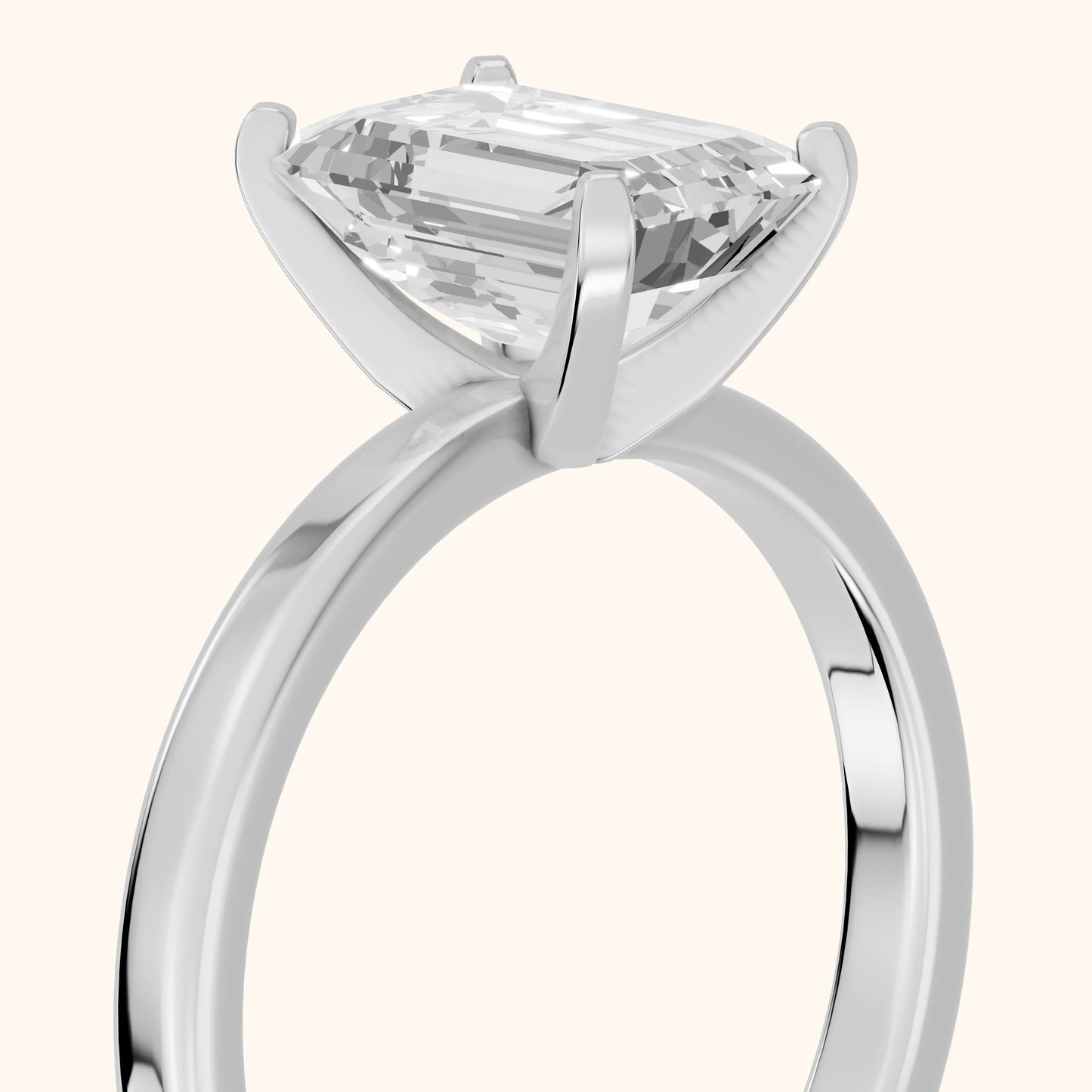 Liana Solitaire Claw Prong Emerald Diamond Engagement Ring in Platinum - slant-view.webp