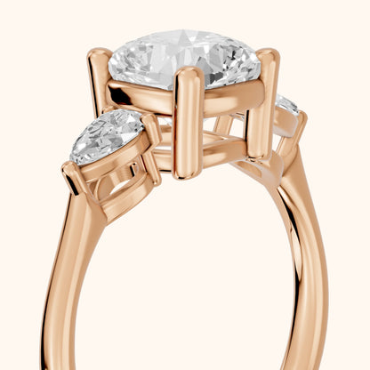 Faye Three-Stone Trellis Cushion Diamond Ring in Rose Gold - slant-view.webp