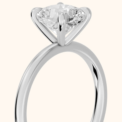 Nella Petite Solitaire Cushion Diamond Engagement Ring in White Gold - slant-view.webp