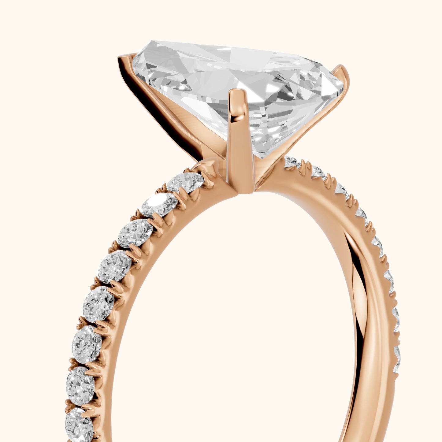 Juna French Pavé Solitaire Pear Diamond Engagement Ring in Rose Gold - slant-view.webp