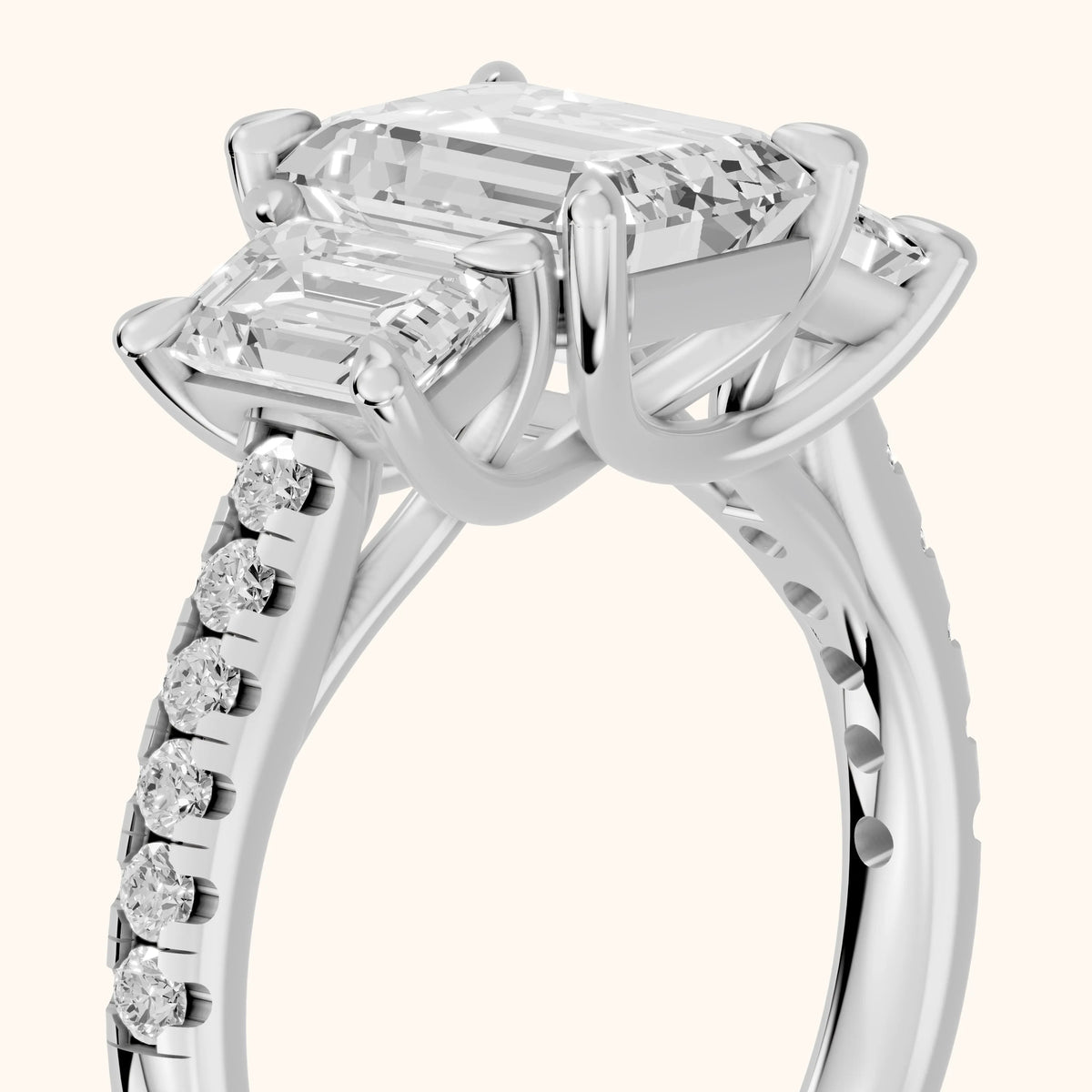 Gabrielle Three-Stone Pavé Emerald Diamond Engagement Ring in Silver - slant-view.webp