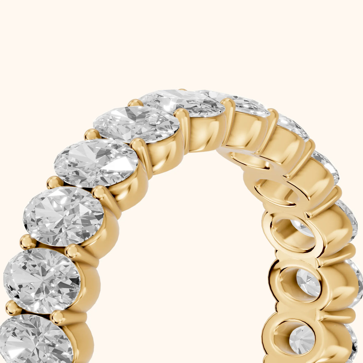 Vidya Shared Prong Oval Diamond Eternity Band in Yellow Gold - slant-view