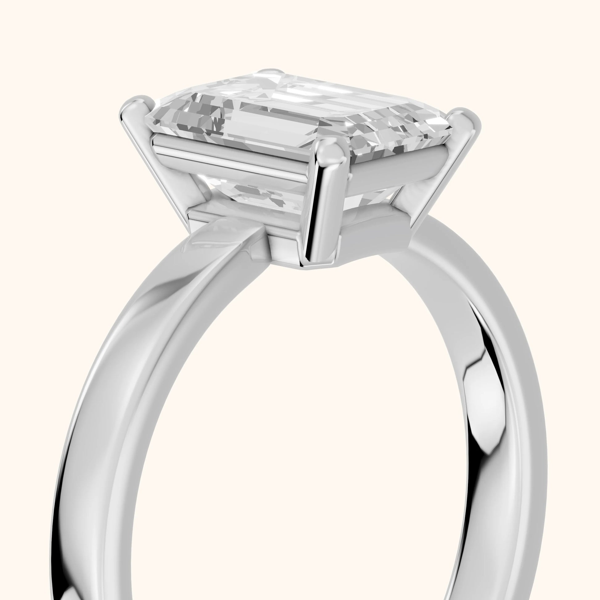 Delia Solitaire Emerald Diamond Engagement Ring in White Gold - slant-view.webp