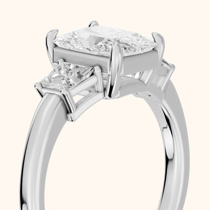 Aria Three-Stone Basket Radiant Diamond Engagement Ring in Silver - slant-view.webp