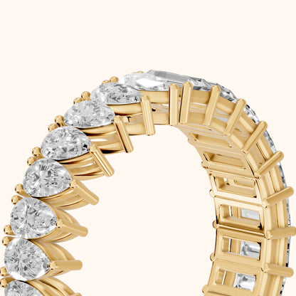 Harriet Shared Prong Pear & Baguette Diamond Eternity Band in Yellow Gold - slant-view
