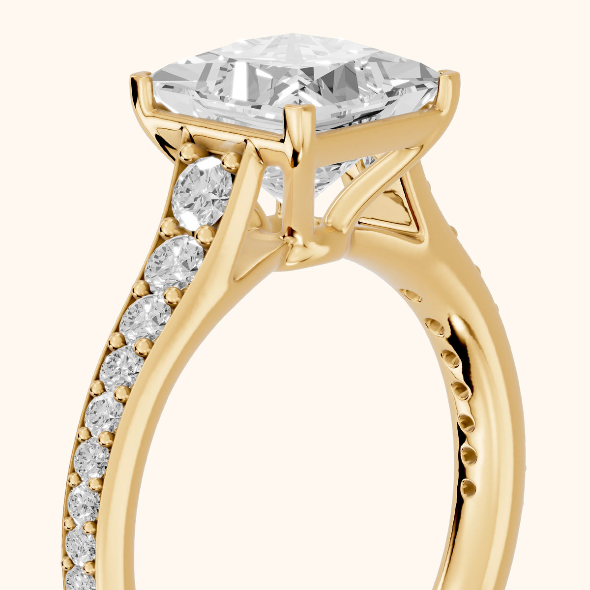 Linda Graduated Pavé Princess Diamond Engagement Ring in Yellow Gold - slant-view.webp