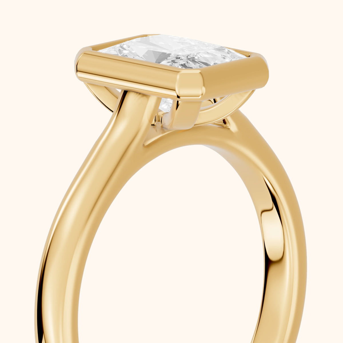 Jolie Bezel Solitaire Radiant Diamond Engagement Ring in Yellow Gold - slant-view.webp
