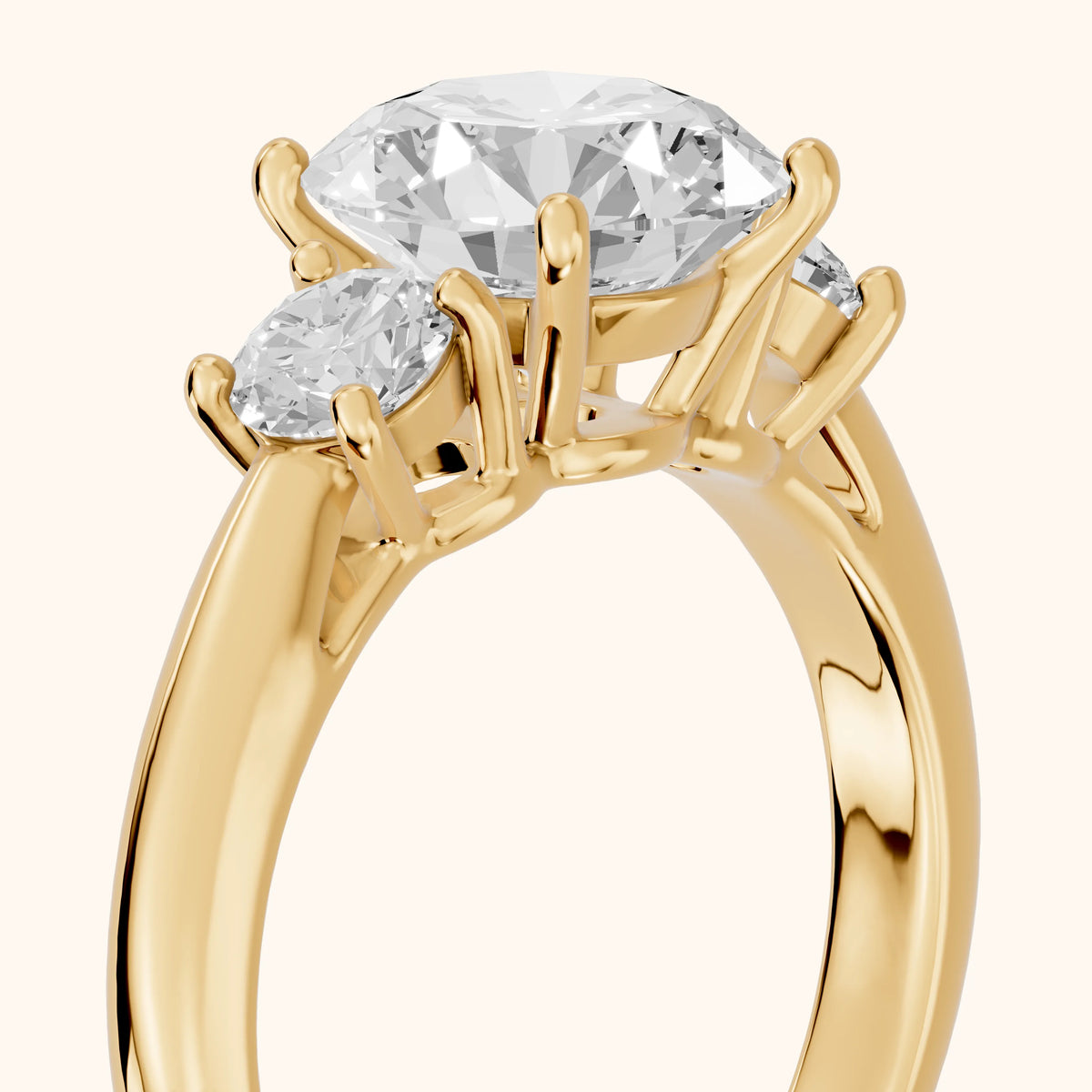 Zara Three-Stone Round Diamond Engagement Ring in Yellow Gold - slant-view.webp