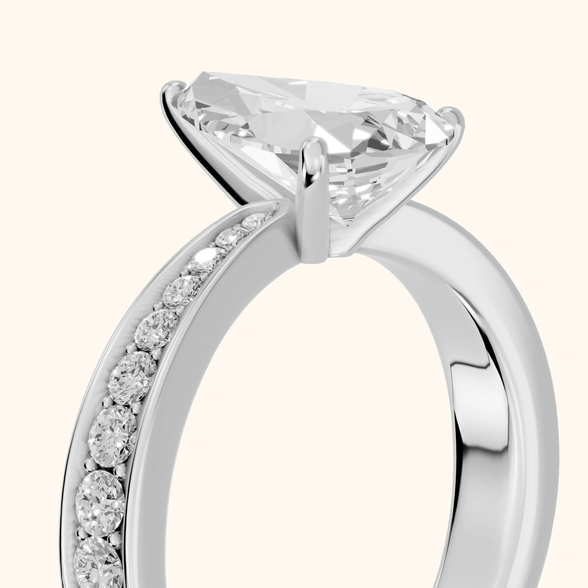 Rhea Sidestone Pavé Pear Diamond Engagement Ring in White Gold - slant-view.webp