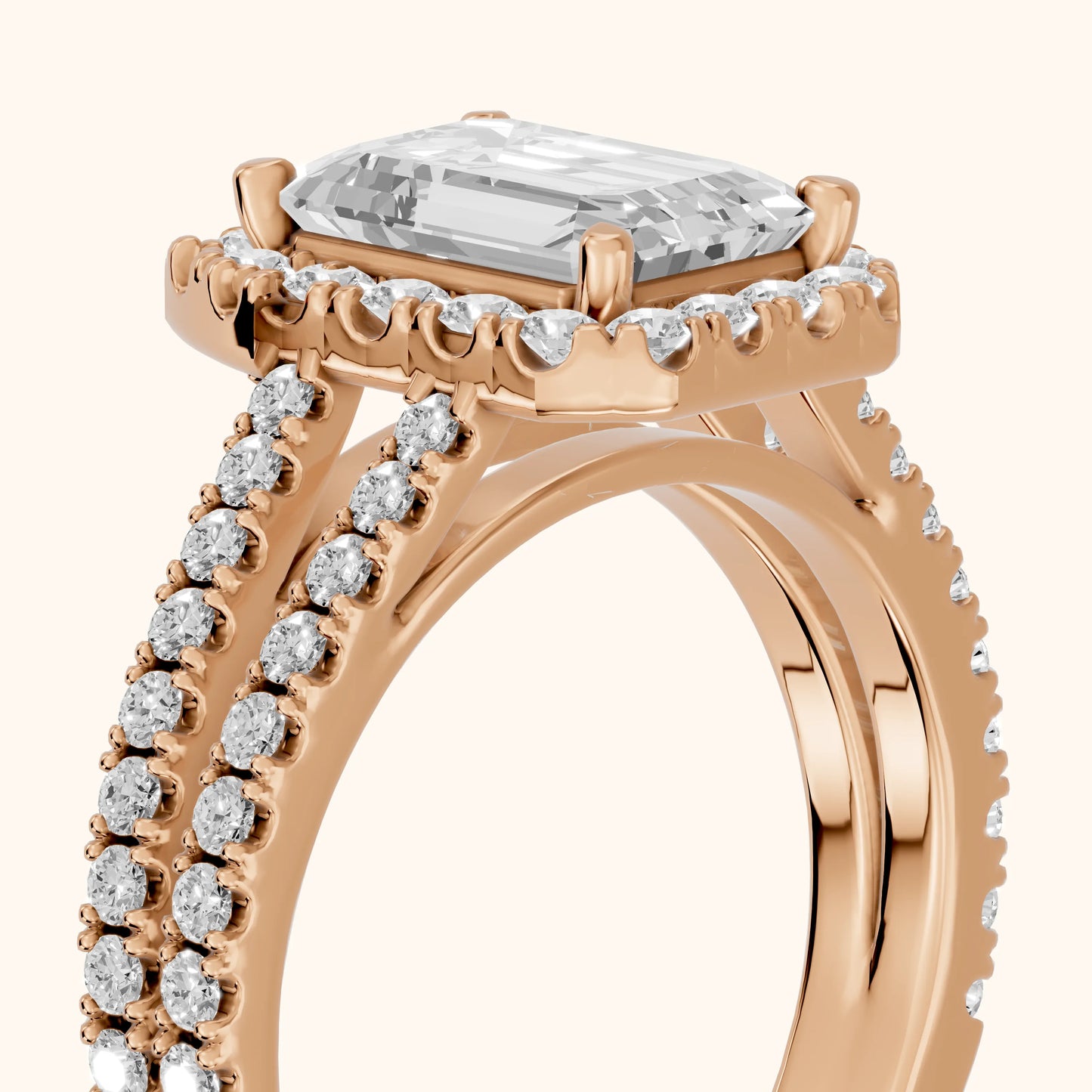 Kira Halo Split Shank Emerald Diamond Engagement Ring in Rose Gold - slant-view.webp