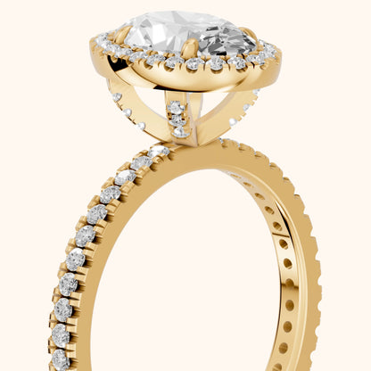 Rosemary Halo Pavé Oval Diamond Engagement Ring in Yellow Gold - slant-view.webp