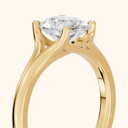 Nell Split Shank Solitaire Cushion Diamond Engagement Ring in Yellow Gold - slant-view.webp