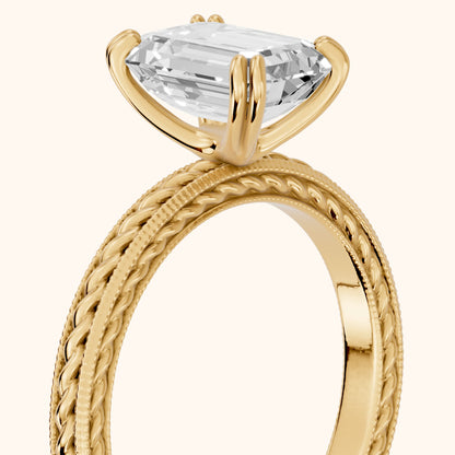 Lacey Rope Solitaire Emerald Diamond Engagement Ring in Yellow Gold - slant-view.webp