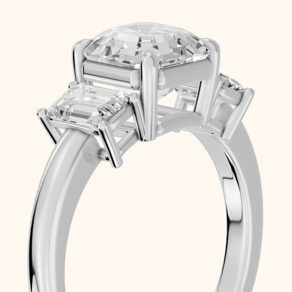 Zoe Three-Stone Asscher Diamond Ring in Platinum - slant-view.webp
