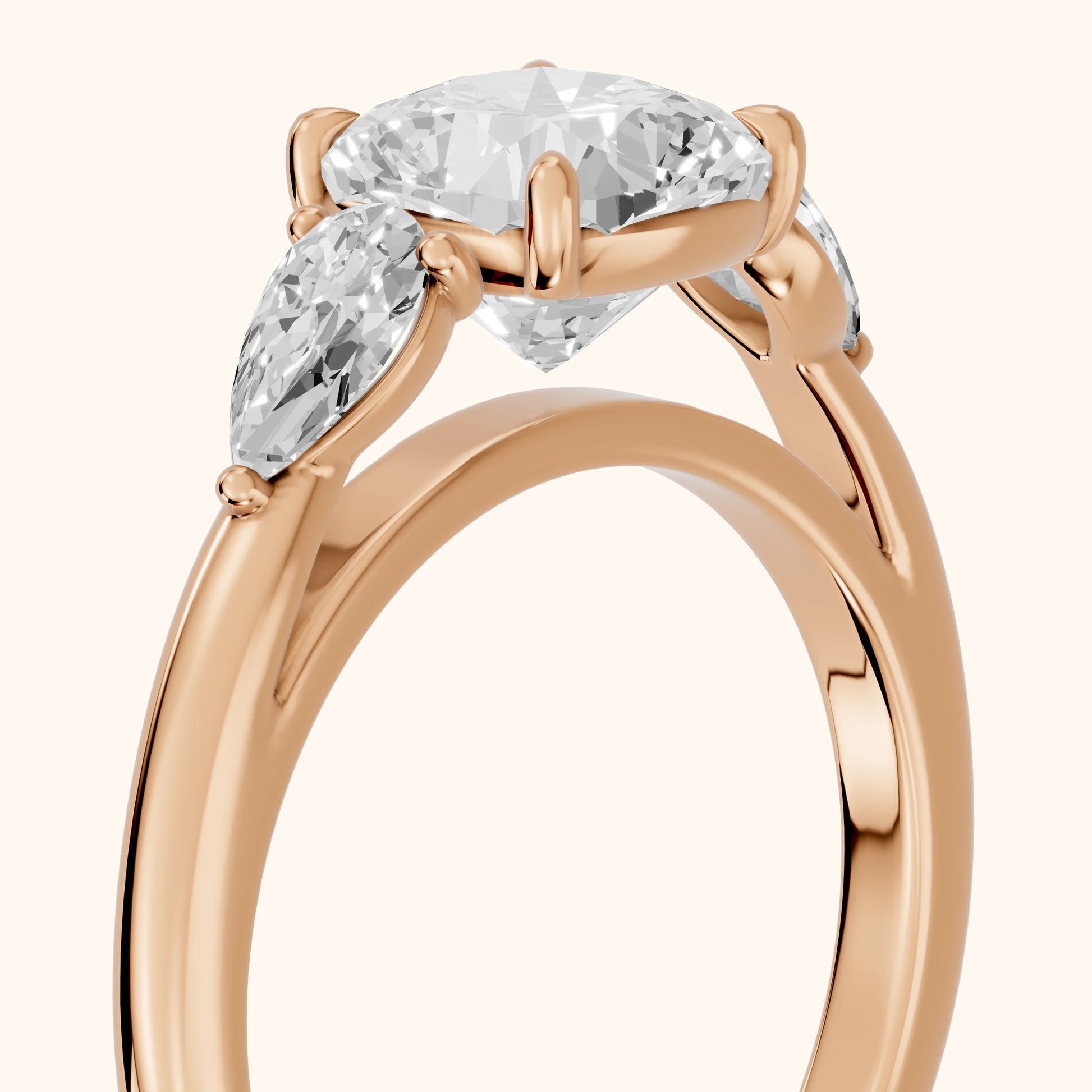 Phoebe Three-Stone Cushion Diamond Ring in Rose Gold - slant-view.webp
