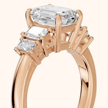 Desiree Graduated Five-Stone Emerald Diamond Engagement Ring in Rose Gold - slant-view.webp