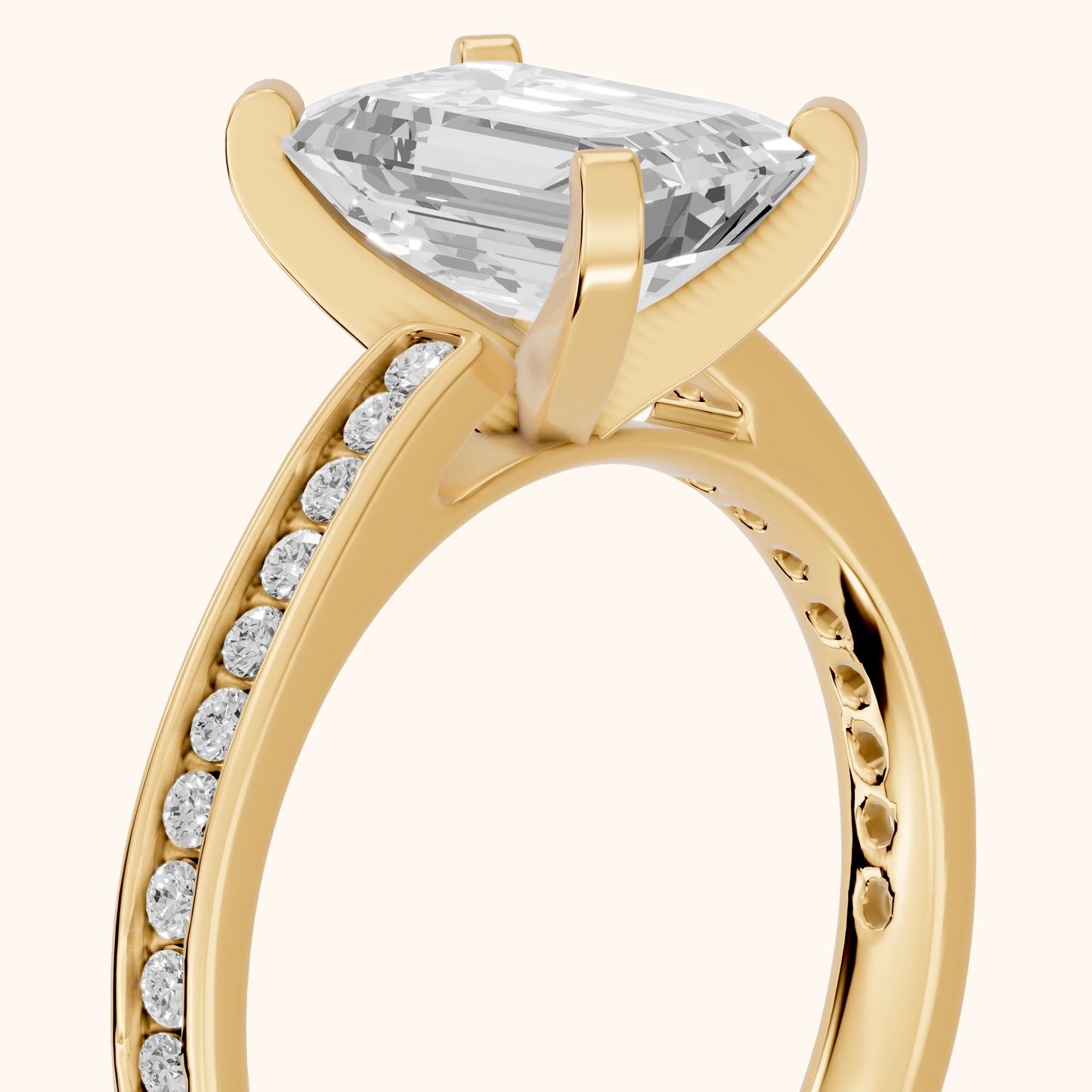 Tessa Solitaire Channel Set Emerald Diamond Engagement Ring in Yellow Gold - slant-view.webp