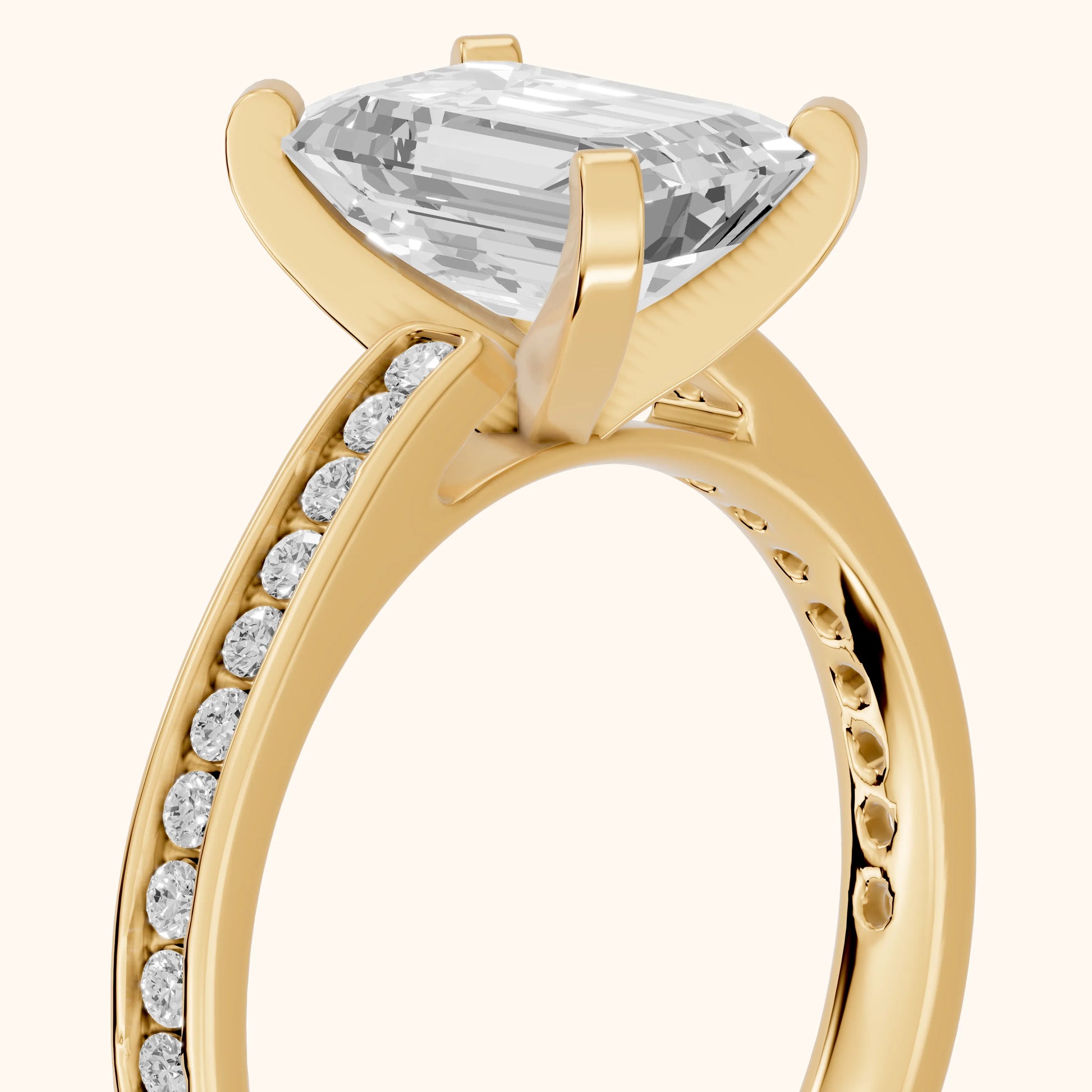 Tessa Solitaire Channel Set Emerald Diamond Engagement Ring in Yellow Gold - slant-view.webp