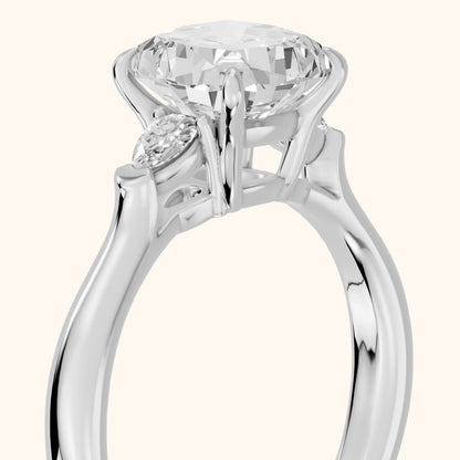 Dahlia Three-Stone Cathedral Cushion Diamond Engagement Ring in White Gold - slant-view.webp