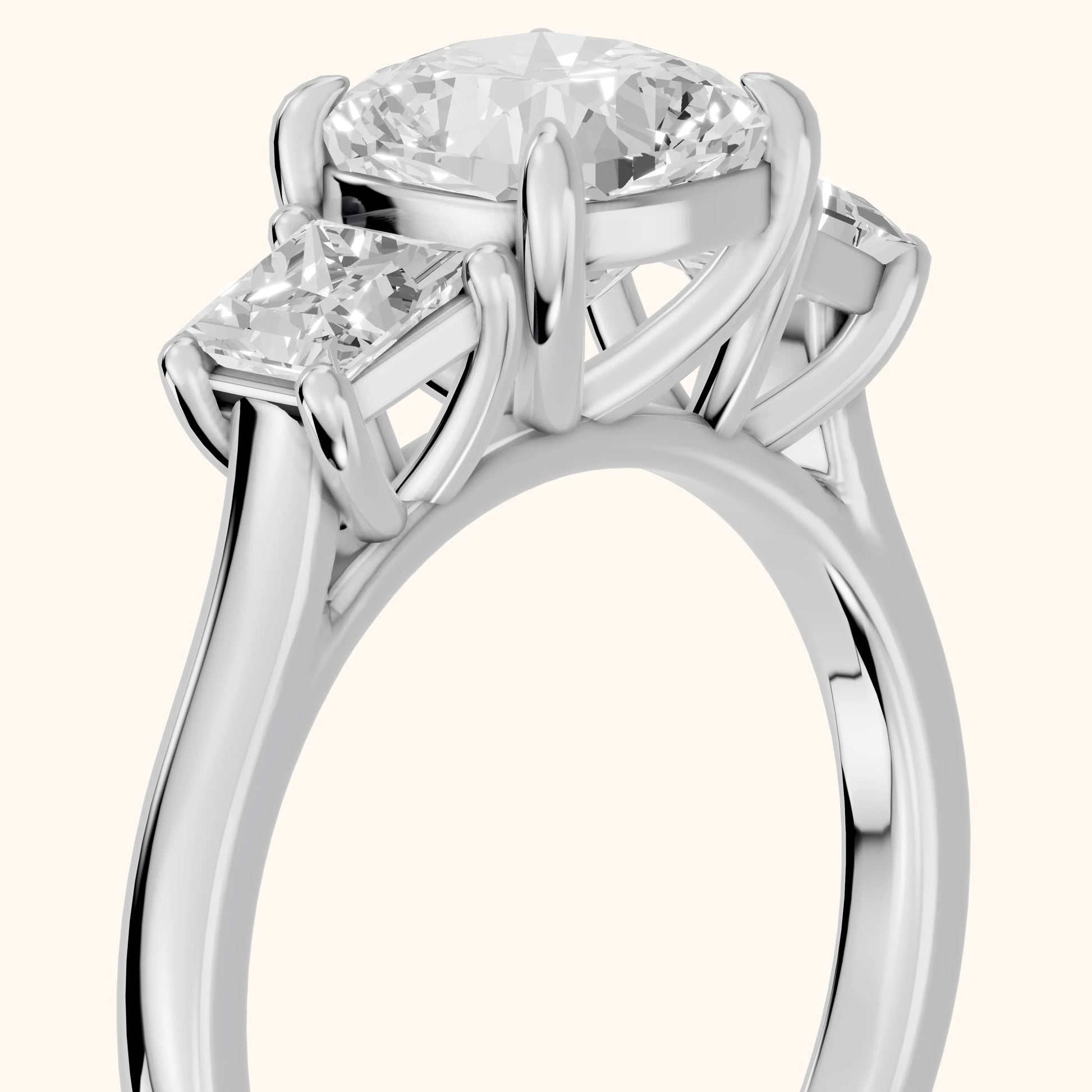 Sienna Three-Stone Cushion Diamond Ring in Platinum - slant-view.webp