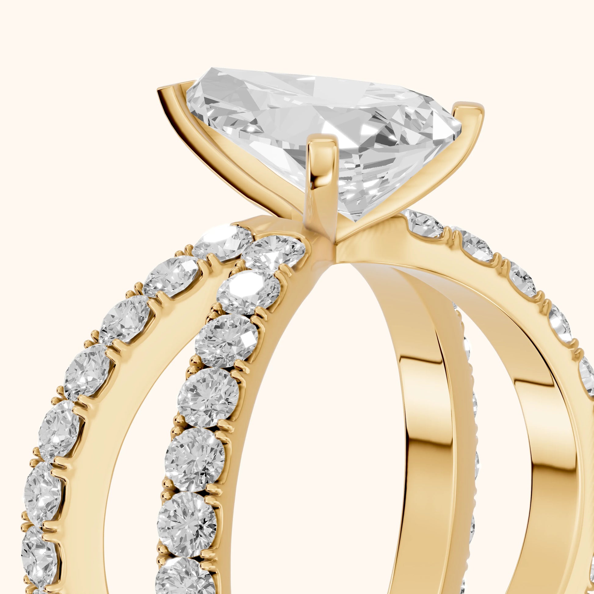 Lior Criss Cross Pavé Pear Diamond Engagement Ring in Yellow Gold - slant-view.webp