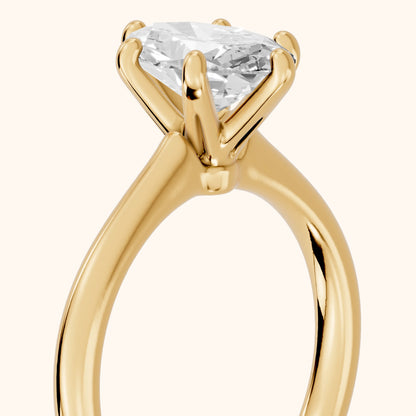 Agatha Solitaire Cathedral Oval Diamond Engagement Ring in Yellow Gold - slant-view.webp