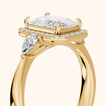 Eliza Halo Sidestone Radiant Diamond Engagement Ring in Yellow Gold - slant-view.webp
