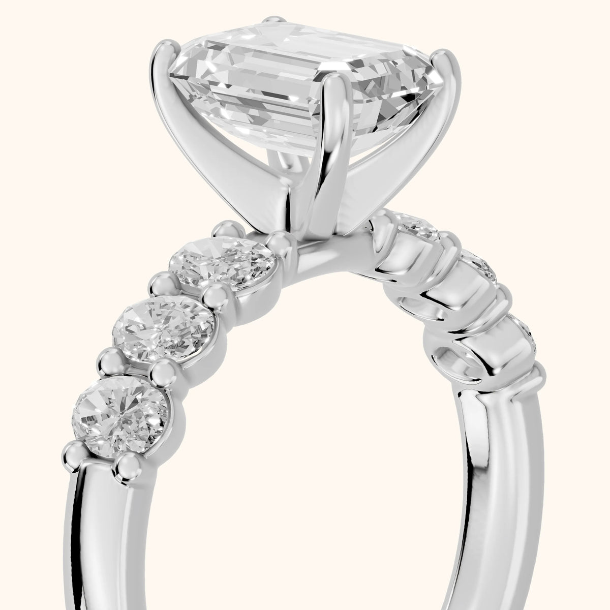Kiera Graduated Seven-Stone Emerald Diamond Engagement Ring in White Gold - slant-view.webp