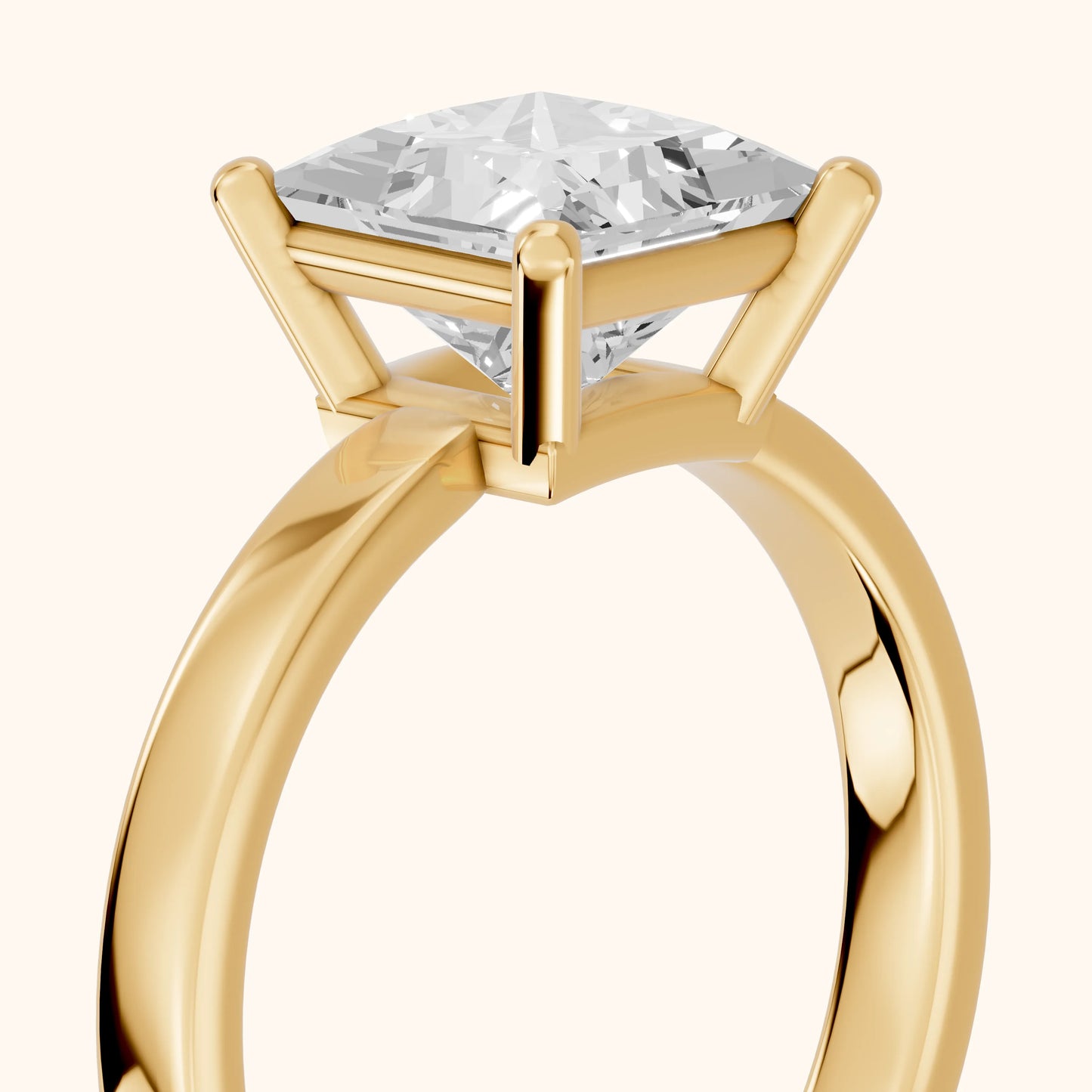 Delia Solitaire Princess Diamond Engagement Ring in Yellow Gold - slant-view.webp