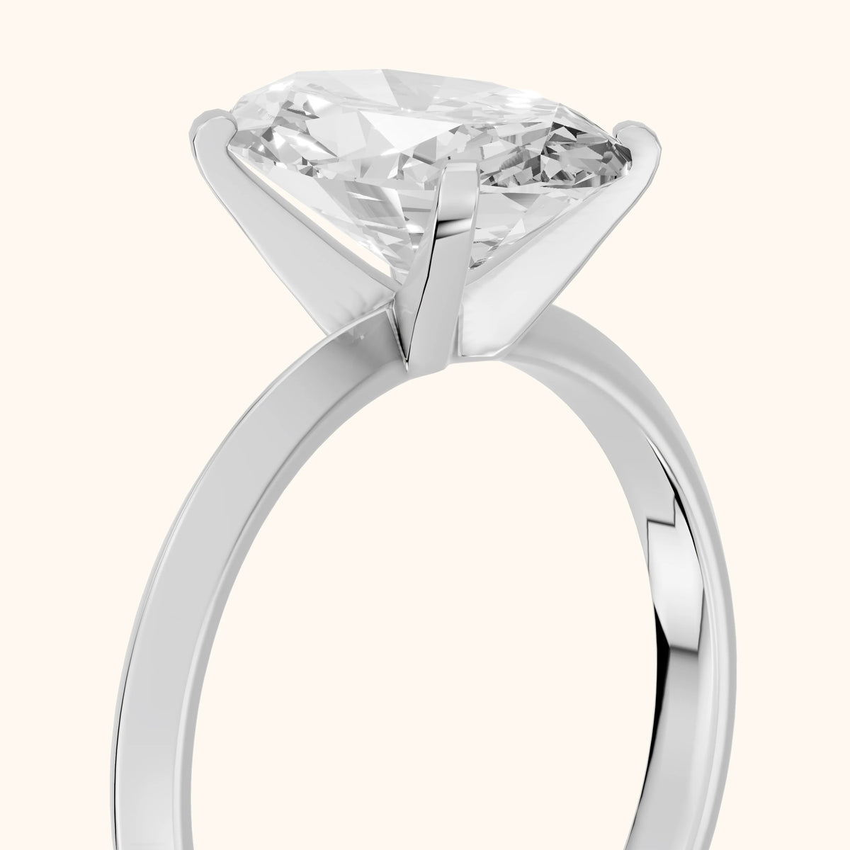 Verity Solitaire Knife Edge Oval Diamond Engagement Ring in Silver - slant-view.webp