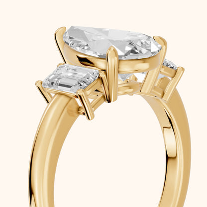 Zoe Three-Stone Pear Diamond Ring in Yellow Gold - slant-view.webp